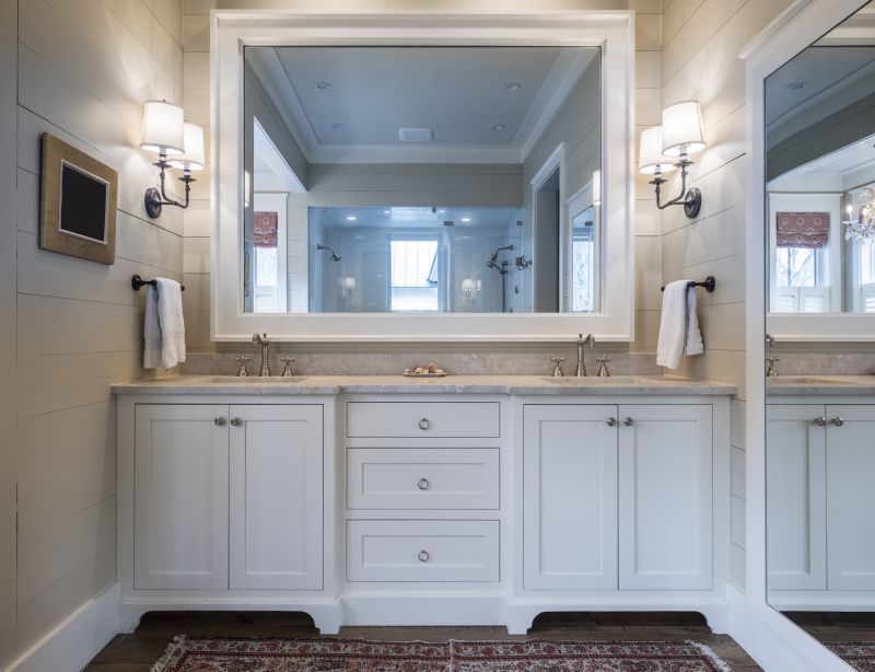 Vanity Area with Double Sinks and Vanity Lighting